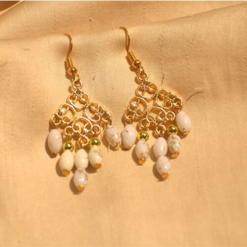 White & gold drop earrings